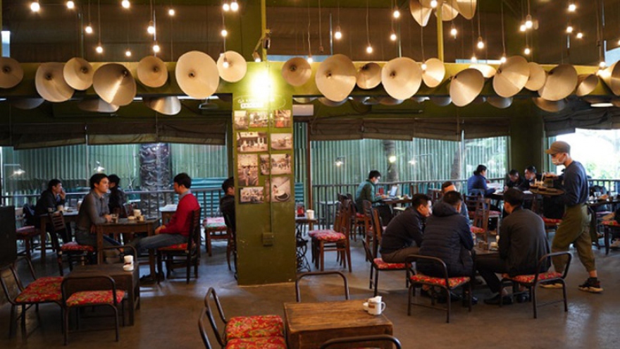 Hanoi coffee shops busy after reopening on March 2